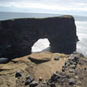 The spectacular arch of basalt rock at Dyrholaey, near Vik