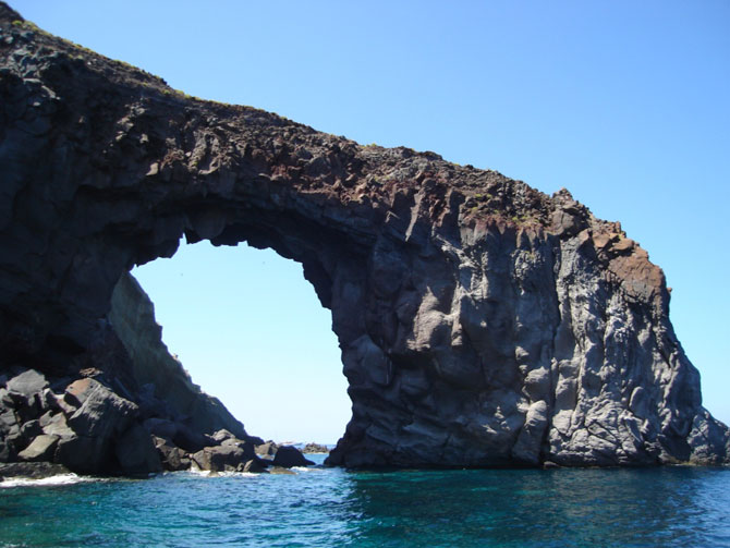 Coastal arch in volcanic rocks on the island of Salina