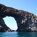 Coastal arch in volcanic rocks on the island of Salina